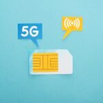 top view of sim card and speech bubbles with 5g lettering on blue background